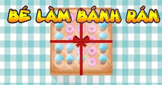 Bé làm bánh rán