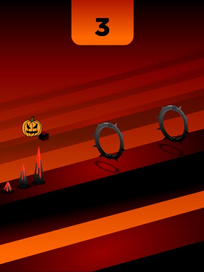 Điều khiển bí ngô nhảy qua các bẫy chông, bẫy gai